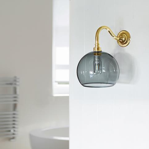 SOHO BATHROOM Smoked Glass Globe Wall Light - Small in Polished Brass