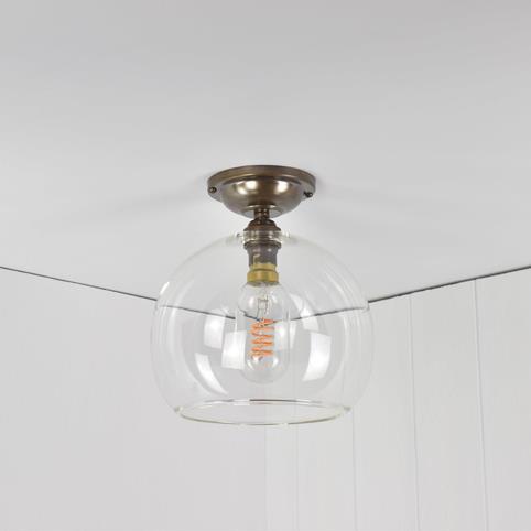 SOHO FLUSH CEILING LIGHT Clear Glass Globe - Medium in Antique Brass