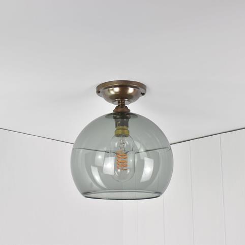 SOHO FLUSH CEILING LIGHT Smoked Glass Globe - Medium in Antique Brass